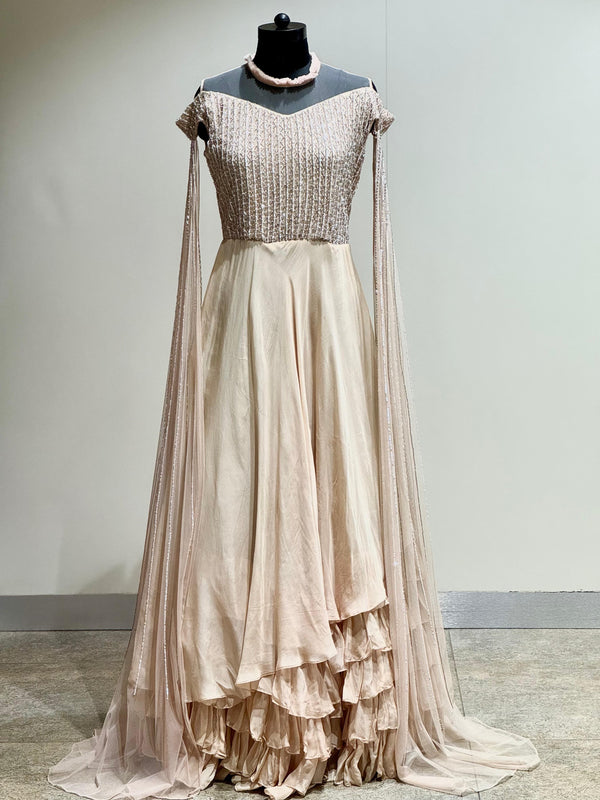 Beige tail sleeves gown