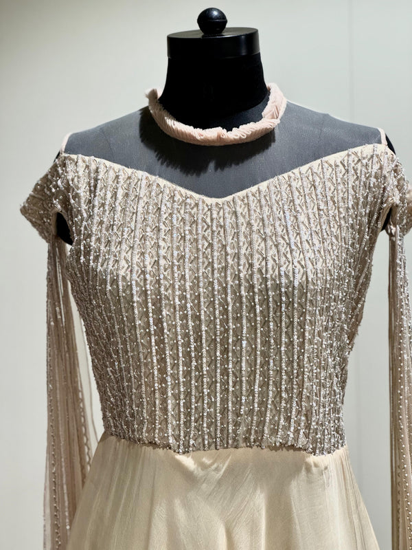 Beige tail sleeves gown