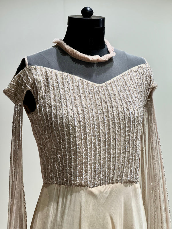 Beige tail sleeves gown
