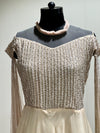 Beige tail sleeves gown