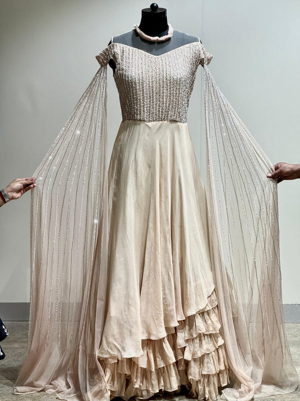 Beige tail sleeves gown
