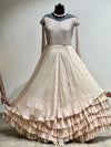 Beige tail sleeves gown